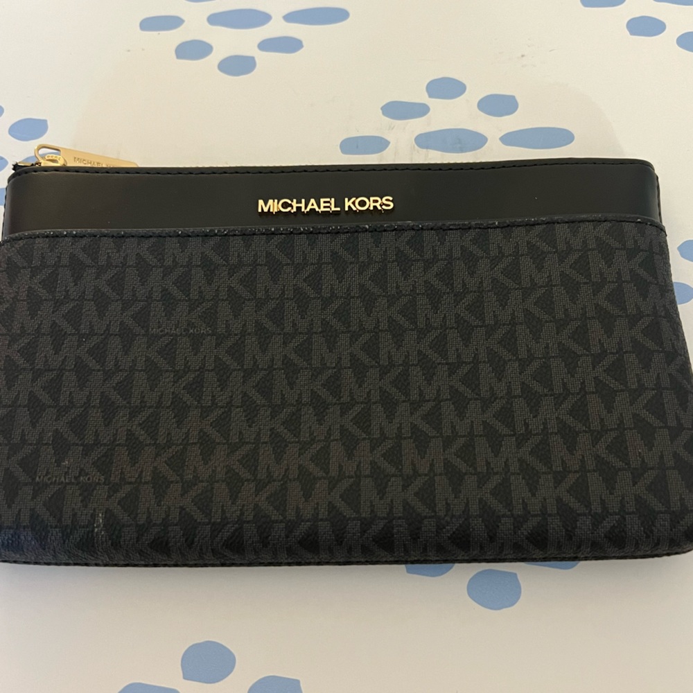 Small black Michael kors monogram clutch